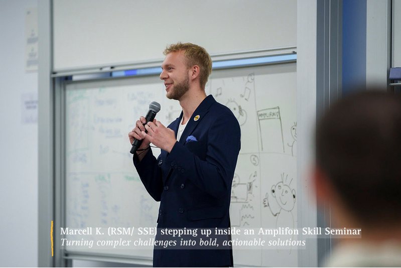 Marcell K., a CEMS student, stepping up inside an Amplifon Skill Seminar.